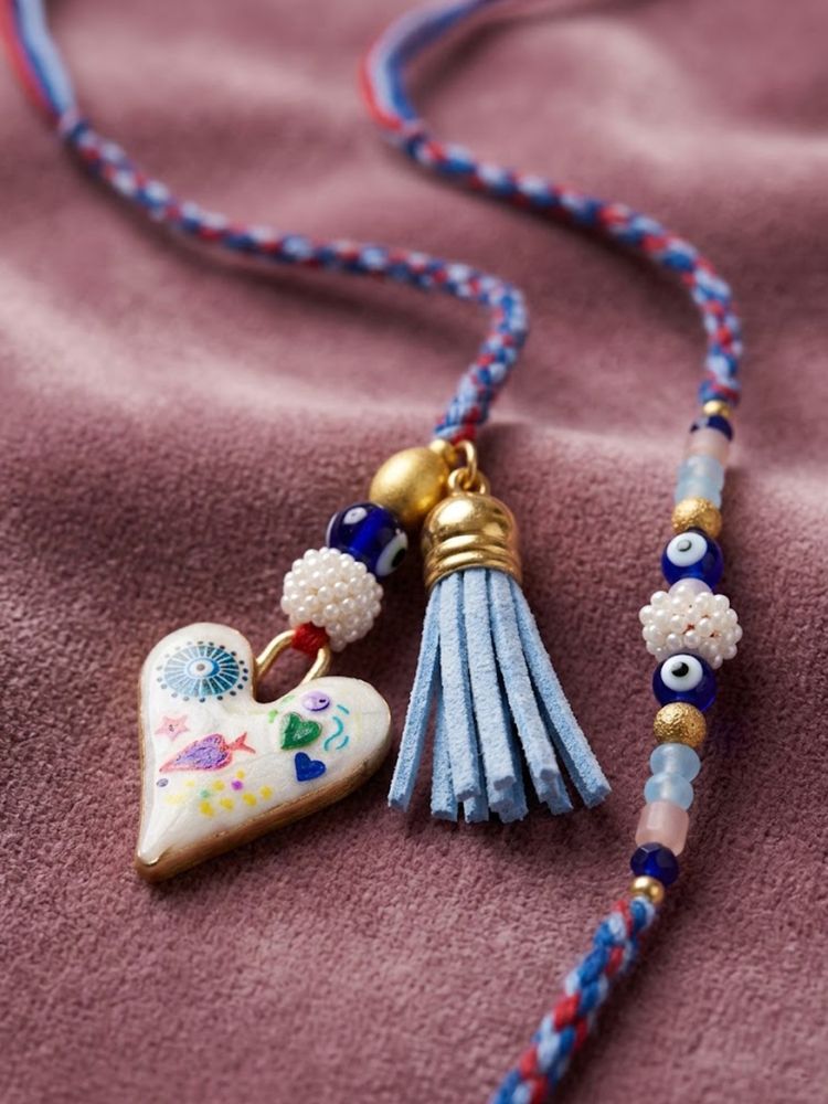 NVR Set of 2 Evil Eye Beaded Heart Shape Bhaiya Bhabhi Rakhi with Roli Chawal Chandan - Dista