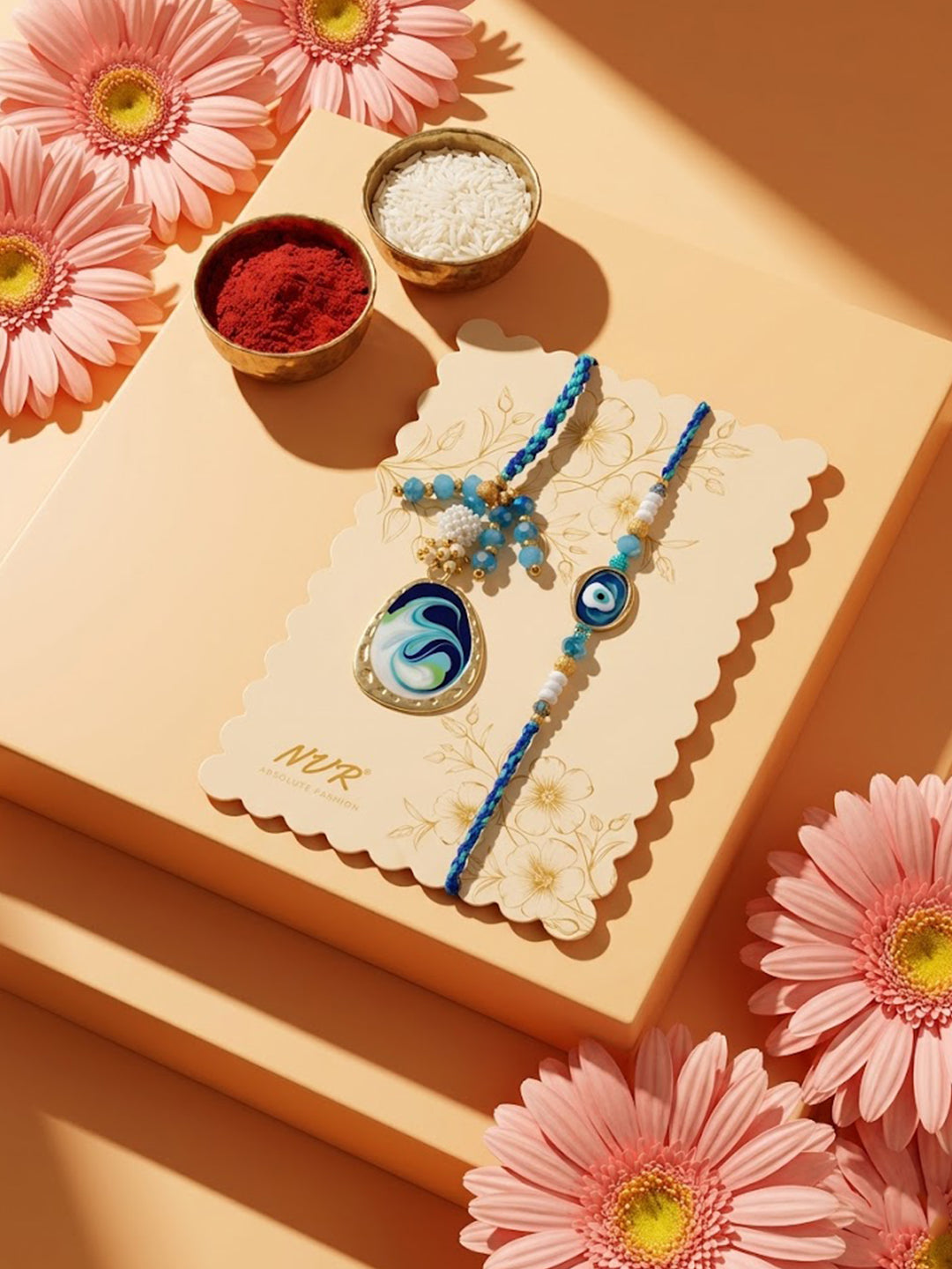 NVR Set of 2 Blue Evil Eye Traditional Gold Toned Bhaiya Bhabhi Rakhi with Roli Chawal - Dista
