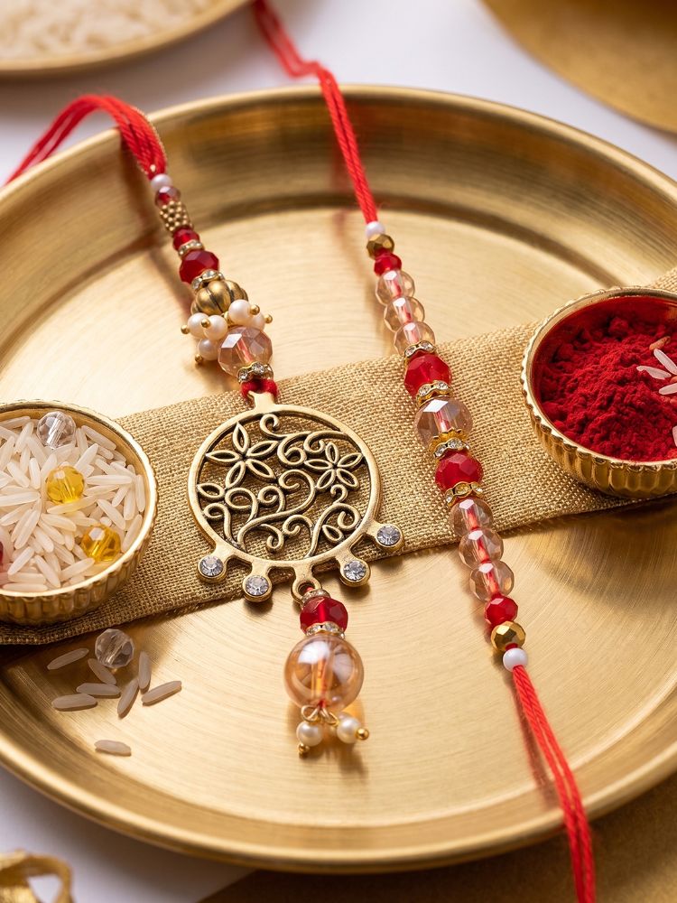 NVR Set of 2 Gold Toned Artificial Stones & Beads Bhaiya Bhabhi Rakhi with Roli Chawal - Dista