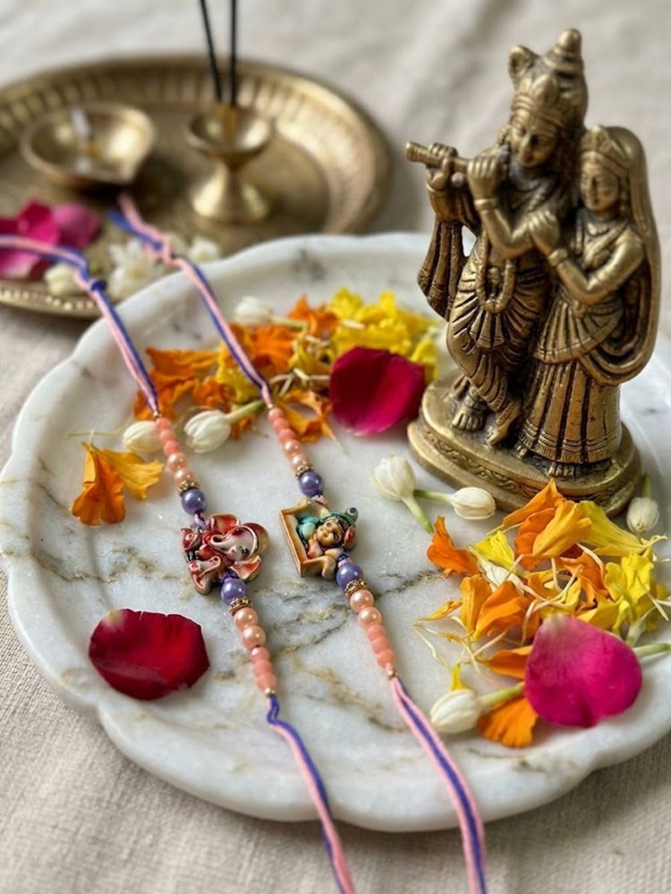 NVR Set of 2 Krishna Ji & Ganesh Ji Beaded Religious Thread Rakhi with Roli Chawal - Dista