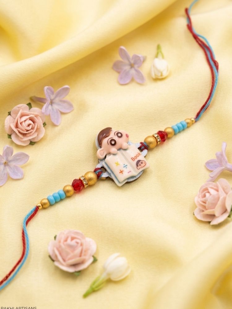 NVR Kids Shinchan Character Artificial Beads Thread Rakhi with Roli Chawal Chandan Mishri - Dista