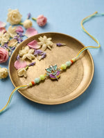 Thumbnail for NVR Multicolor Artificial Beads Ganesh Ji Thread Rakhi With Roli Chawal Chandan Mishri - Dista