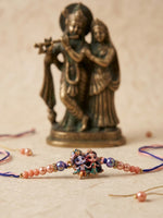 Thumbnail for NVR Radha Krishna Multicolor Artificial Beads Thread Rakhi With Roli Chawal Chandan Mishri - Dista