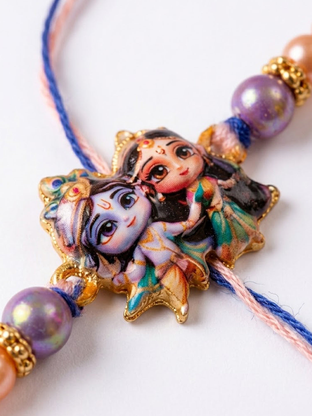 NVR Radha Krishna Multicolor Artificial Beads Thread Rakhi With Roli Chawal Chandan Mishri - Dista