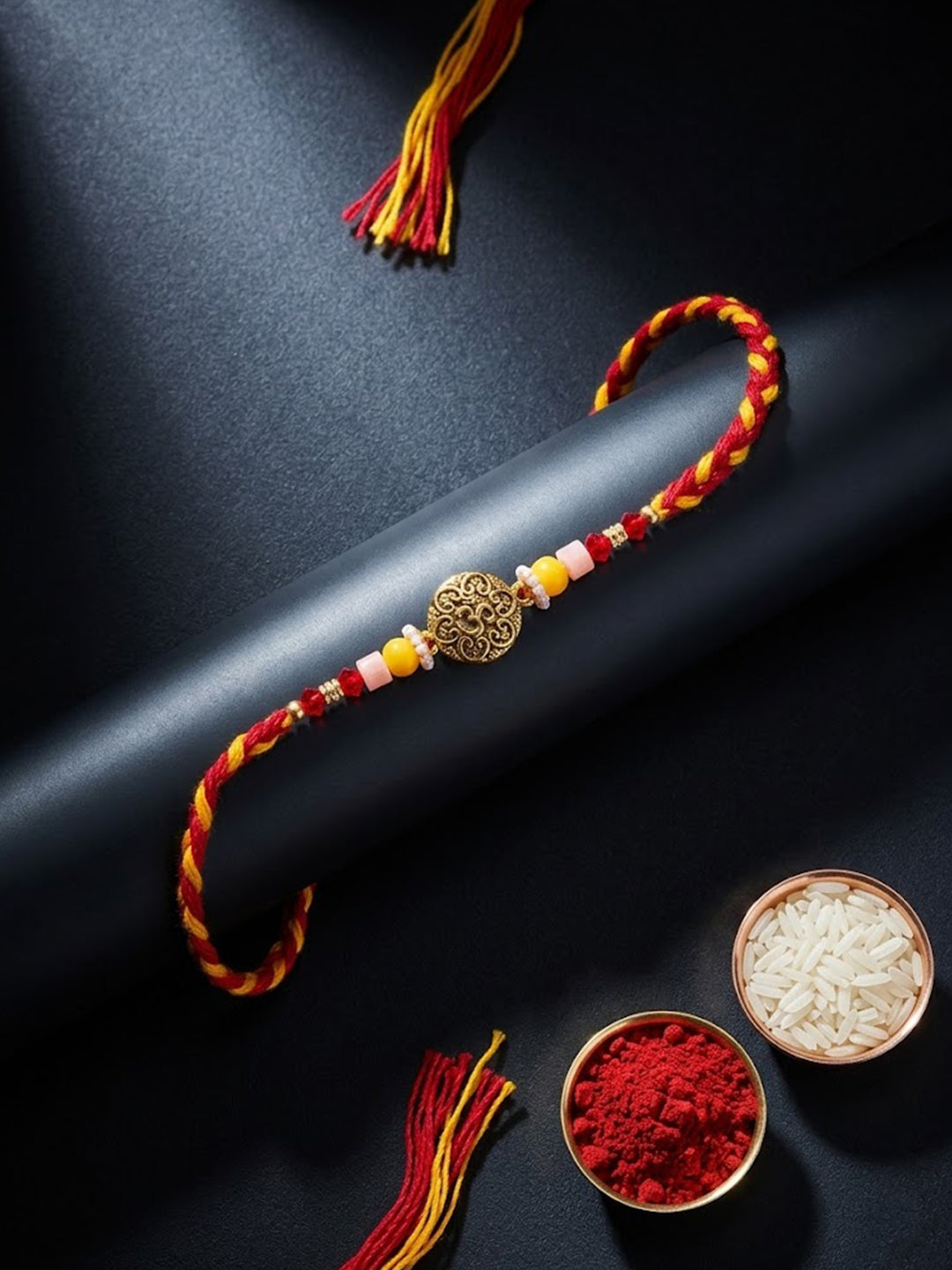 NVR Artificial Beads Decorative Om Design Religious Thread Rakhi with Roli Chawal Chandan - Dista