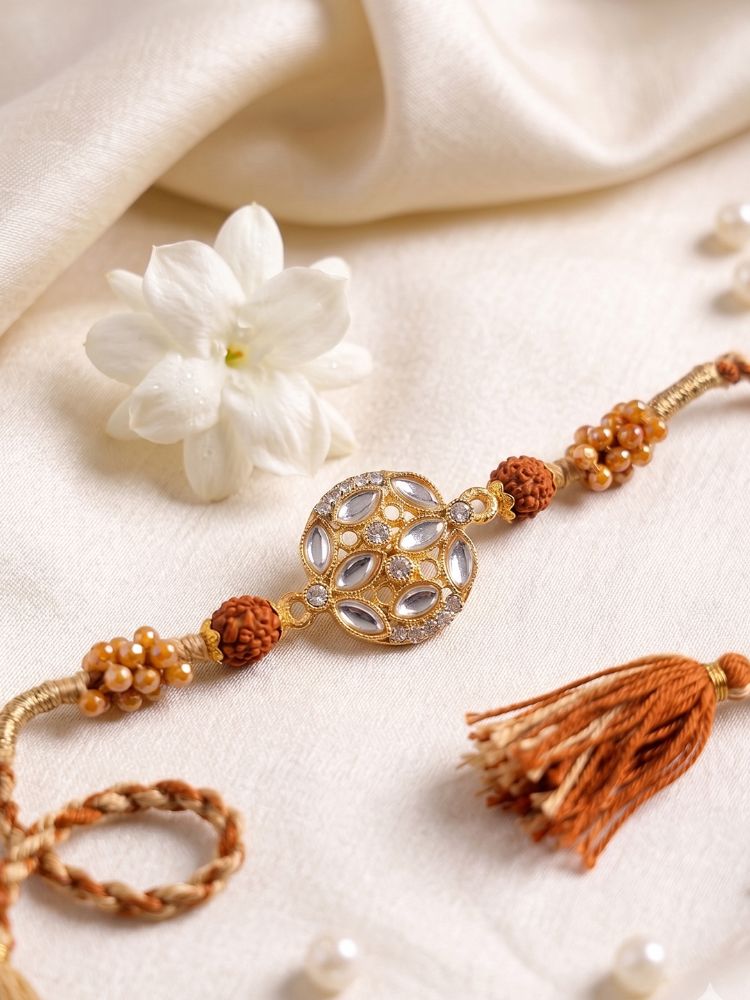 NVR Rudraksh & Kundan Studded Gold Toned Thread Rakhi with Roli Chawal Chandan Mishri - Dista