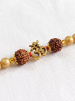 Thumbnail for NVR Om Design Rudraksh Thread Rakhi with Roli Chawal Chandan Mishri - Dista