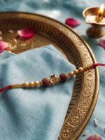Thumbnail for NVR Om Design Rudraksh Thread Rakhi with Roli Chawal Chandan Mishri - Dista