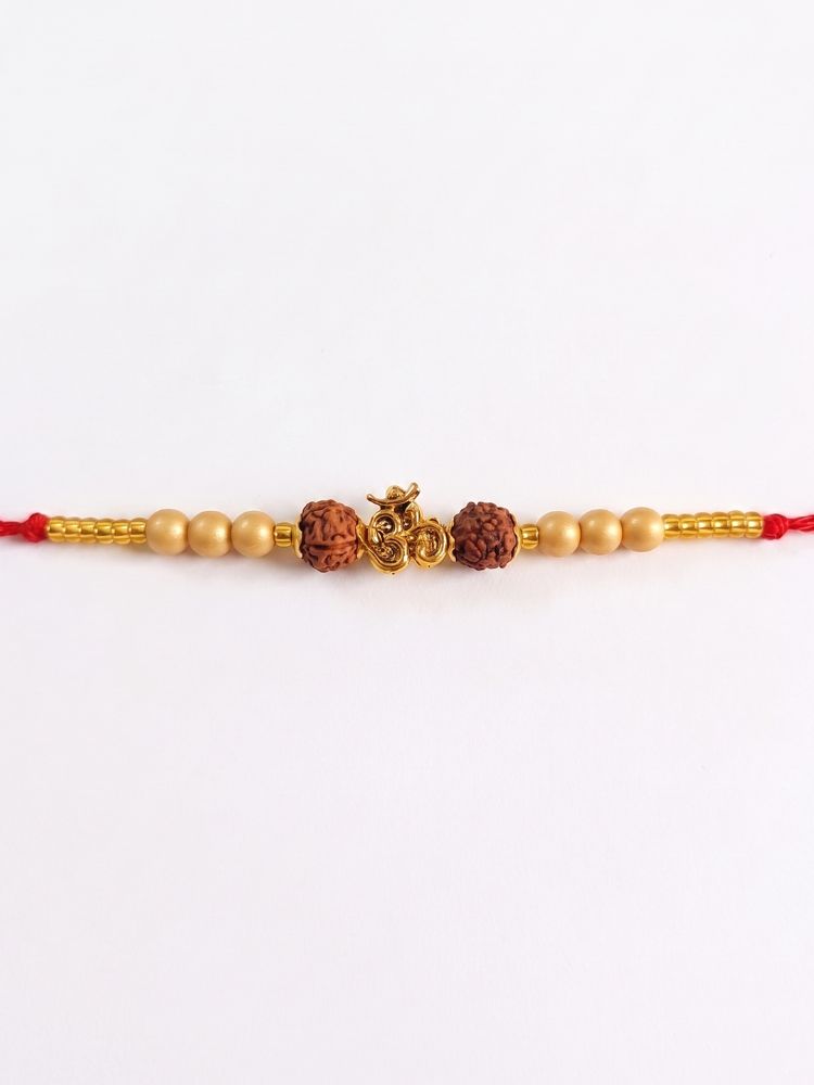 NVR Om Design Rudraksh Thread Rakhi with Roli Chawal Chandan Mishri - Dista
