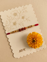 Thumbnail for NVR Religious Rudraksh & Red Thread Rakhi with Roli Chawal Chandan Mishri - Dista