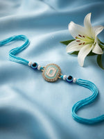 Thumbnail for NVR Blue Evil Eye & Artificial Stones Oval Shape Thread Rakhi with Roli Chawal Chandan - Dista