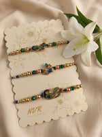 Thumbnail for NVR Set of 3 Peacock Design Multicolor Artificial Beads Thread Rakhi With Roli Chawal - Dista