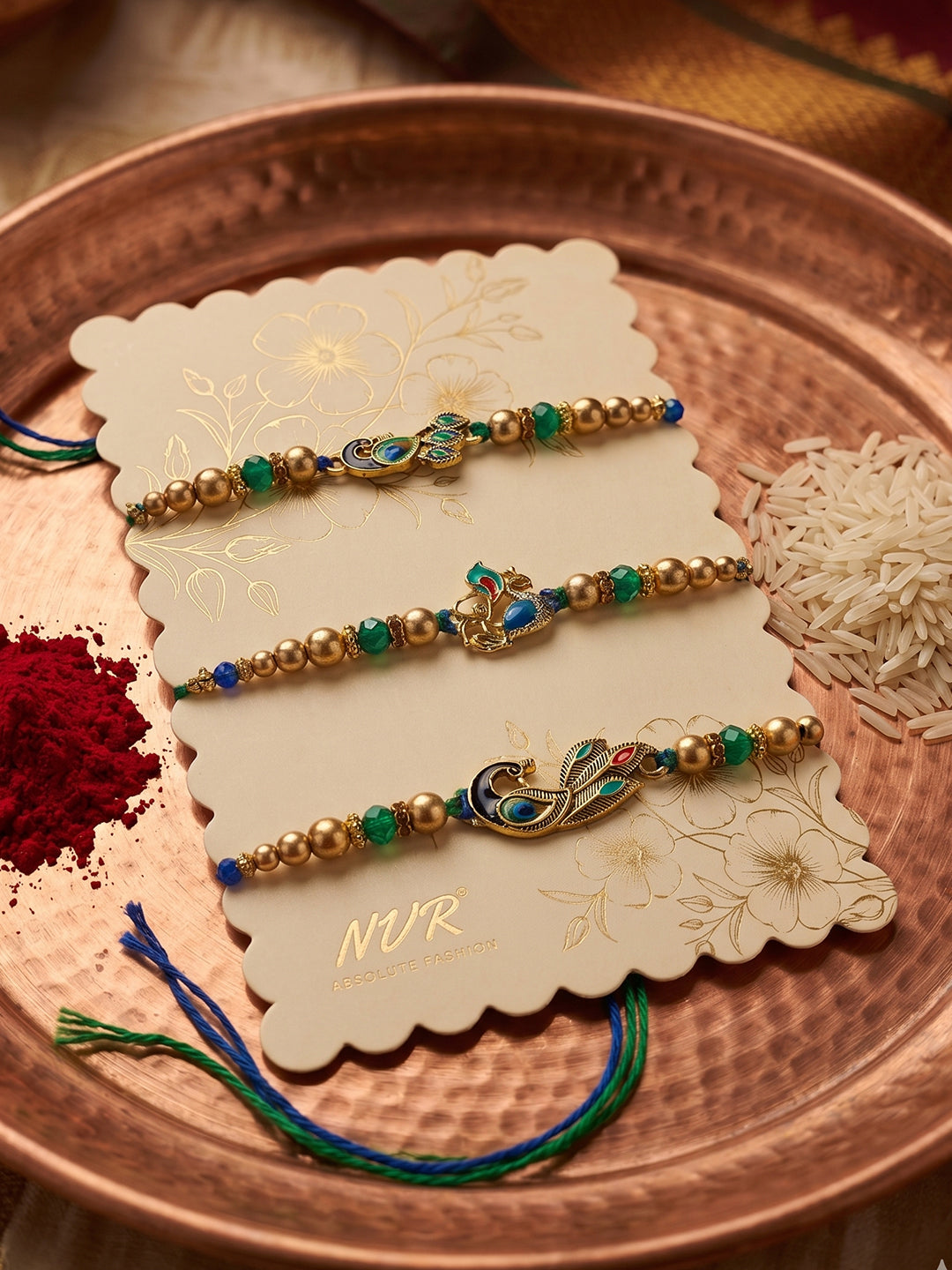 NVR Set of 3 Peacock Design Multicolor Artificial Beads Thread Rakhi With Roli Chawal - Dista