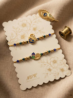 Thumbnail for NVR Set of 2 Krishna & Peacock Design Artificial Beads Thread Rakhi With Roli Chawal - Dista
