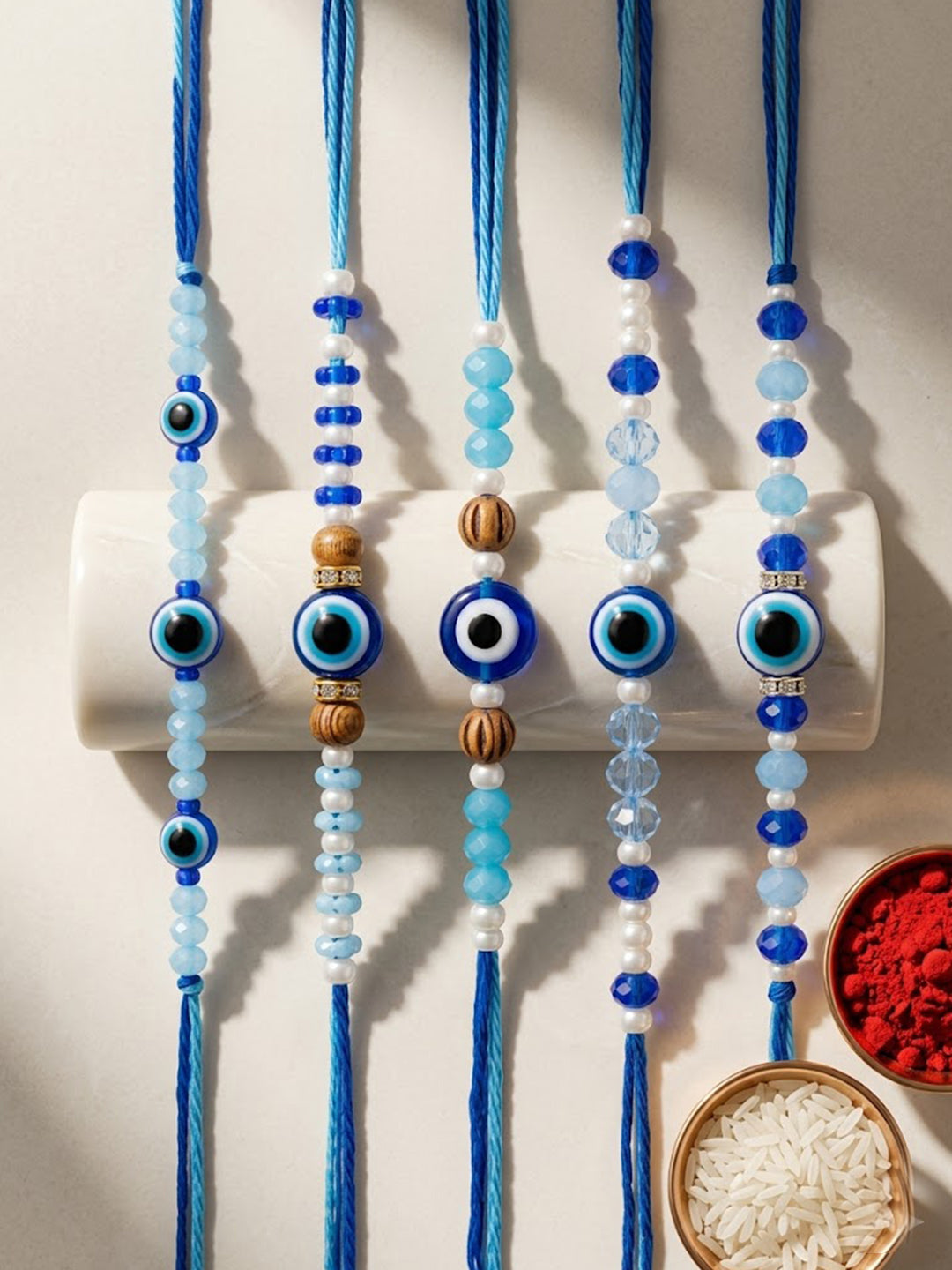 NVR Set of 5 Blue Evil Eye Thread Rakhi with Roli Chawal Chandan Mishri - Dista
