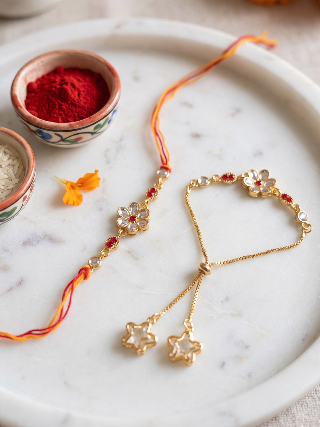 NVR Set of 2 Gold Toned Kundan Studded Bhaiya Bhabhi Rakhi with Roli Chawal Chandan Mishri - Dista