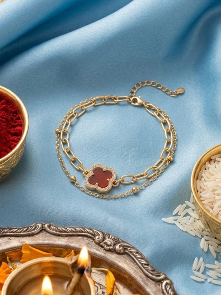 NVR Women Artrificial Stones Gold Plated Rakhi with Roli Chawal Chandan Mishri - Dista