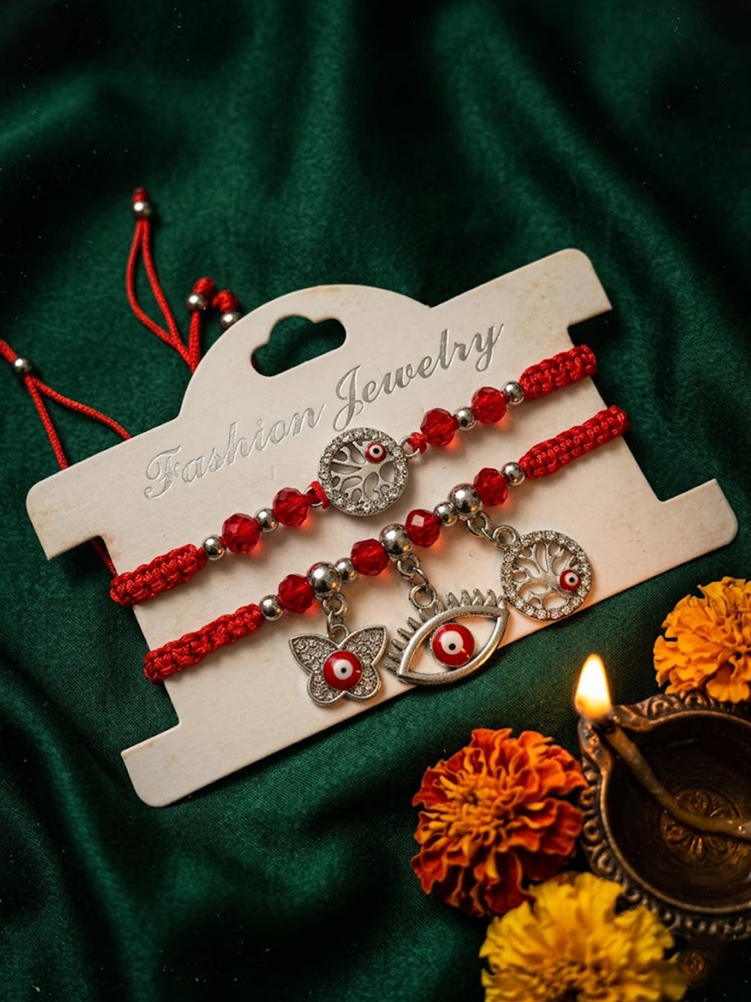 NVR Set of 2 Red & Silver Evil Eye Design Bhaiya Bhabhi Rakhi with Roli Chawal Chandan - Dista
