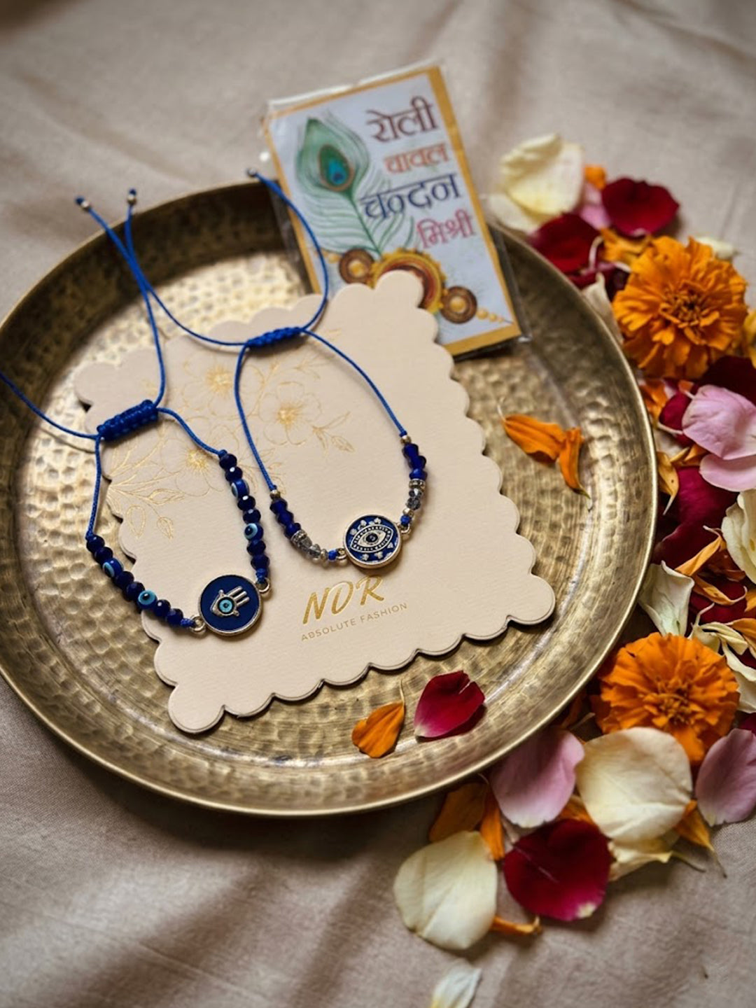 NVR Set of 2 Blue Evil Eye Thread Rakhi With Roli Chawal Chandan Mishri - Dista
