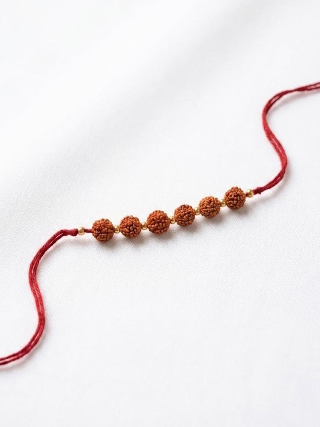 NVR Religious Rudraksh Thread Rakhi With Roli Chawal Chandan Mishri - Dista