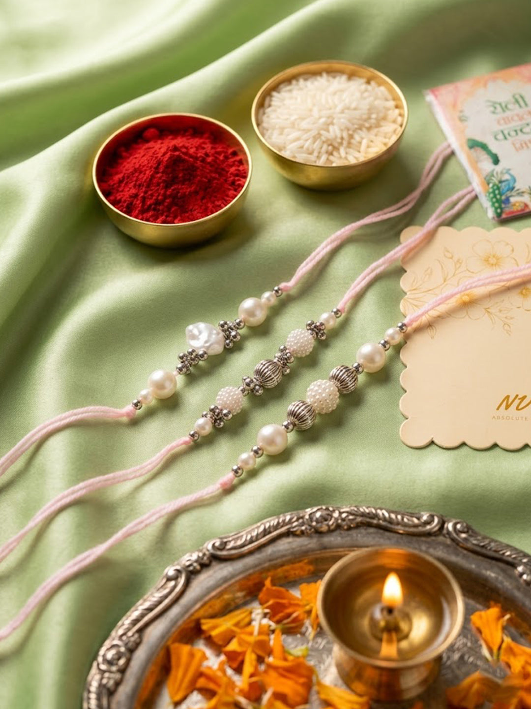 NVR Set of 3 White Pearls Thread Rakhi with Roli Chawal Chandan Mishri - Dista