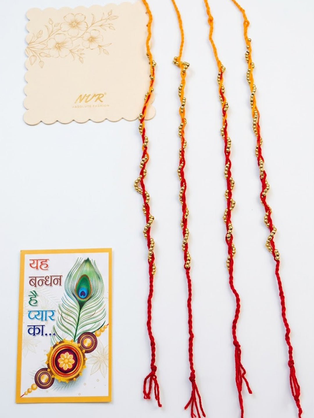 NVR Set of 4 Red & Yellow Thread Rakhi with Roli Chawal Chandan Mishri - Dista