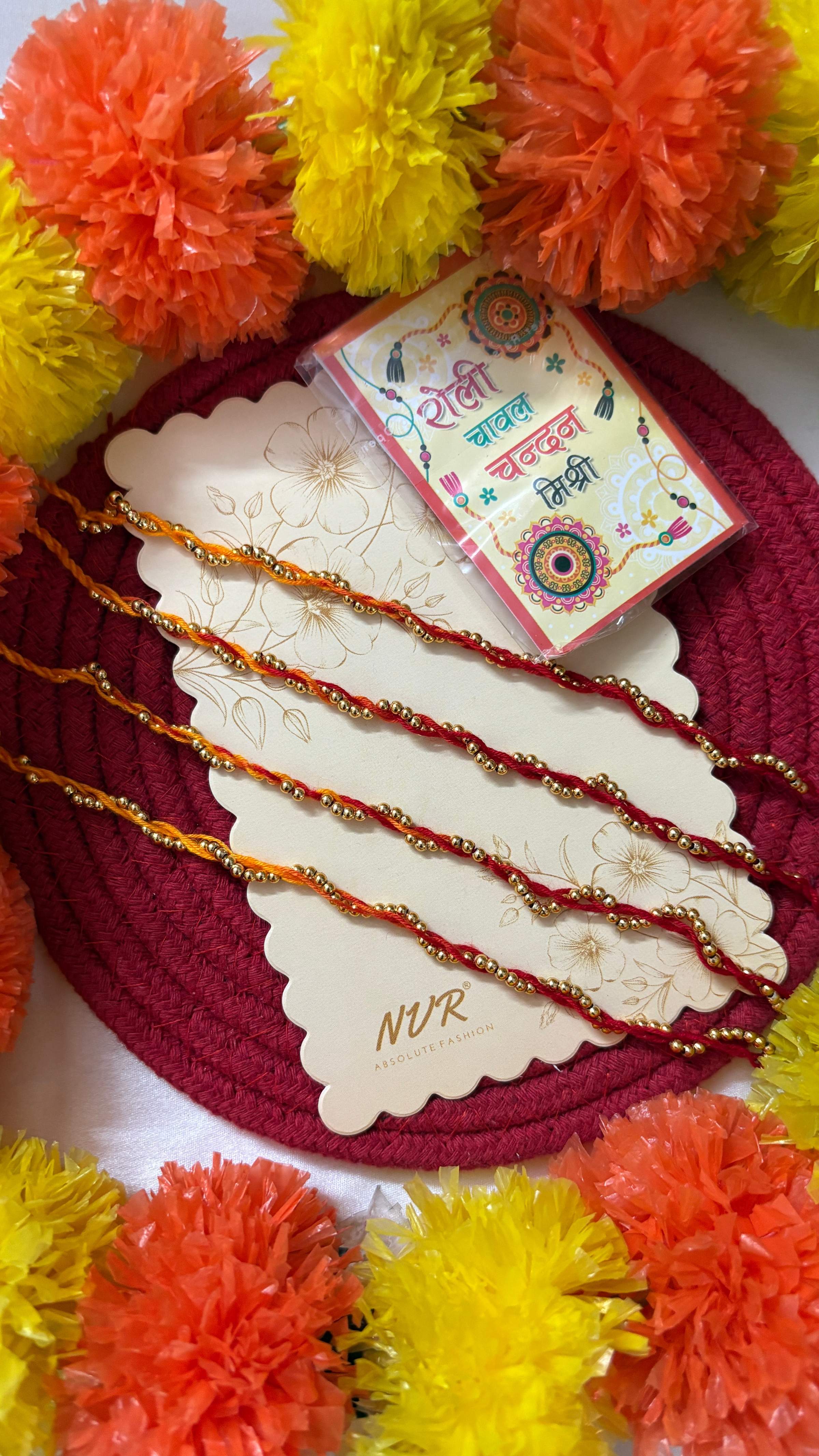 NVR Set of 4 Yellow & Red Thread Rakhi with Roli Chawal Chandan Mishri - Dista