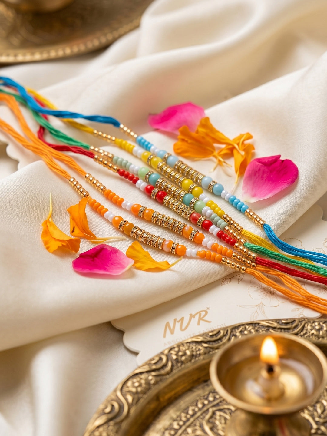 NVR Set of 6 Multi Artificial Beads Thread Rakhi with Roli Chawal Chandan Mishri - Dista