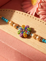 Thumbnail for NVR Artificial Beads Flower Shape Multicolor Thread Rakhi with Roli Chawal Chandan Mishri - Dista