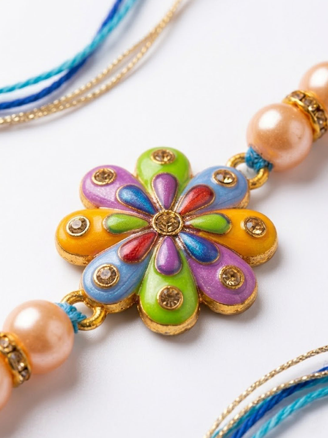 NVR Artificial Beads Flower Shape Multicolor Thread Rakhi with Roli Chawal Chandan Mishri - Dista
