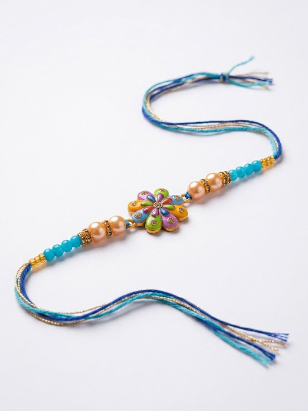 NVR Artificial Beads Flower Shape Multicolor Thread Rakhi with Roli Chawal Chandan Mishri - Dista