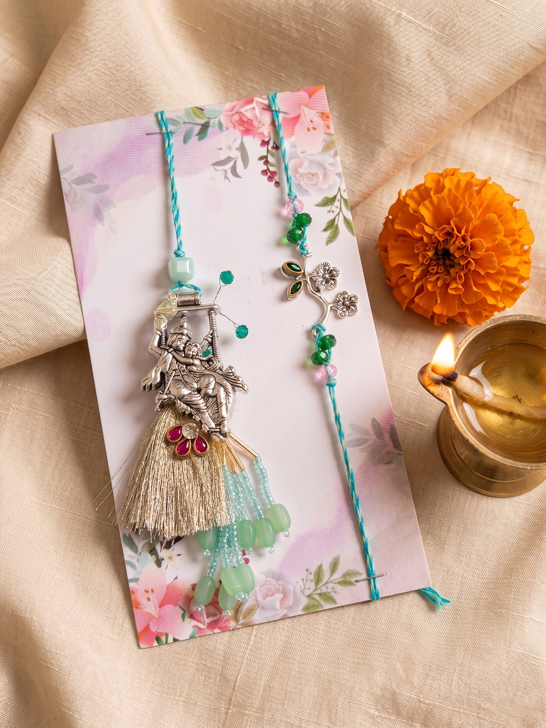 NVR Set of 2 Designer Religious Silver Toned Bhaiya Bhabhi Rakhi with Roli Chawal Chandan - Dista