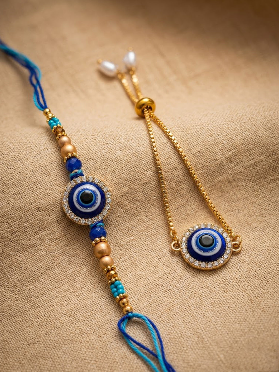 NVR Set of 2 Blue Evil Eye Gold Toned Bhaiya Bhabhi Rakhi with Roli Chawal Chandan Mishri - Dista