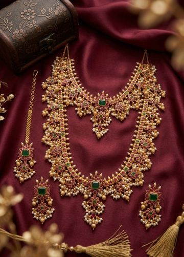 Jewel City Gold Plated Ruby Emerald Pearl Long Haram Necklace, Earrings & Maang Tikka - Dista