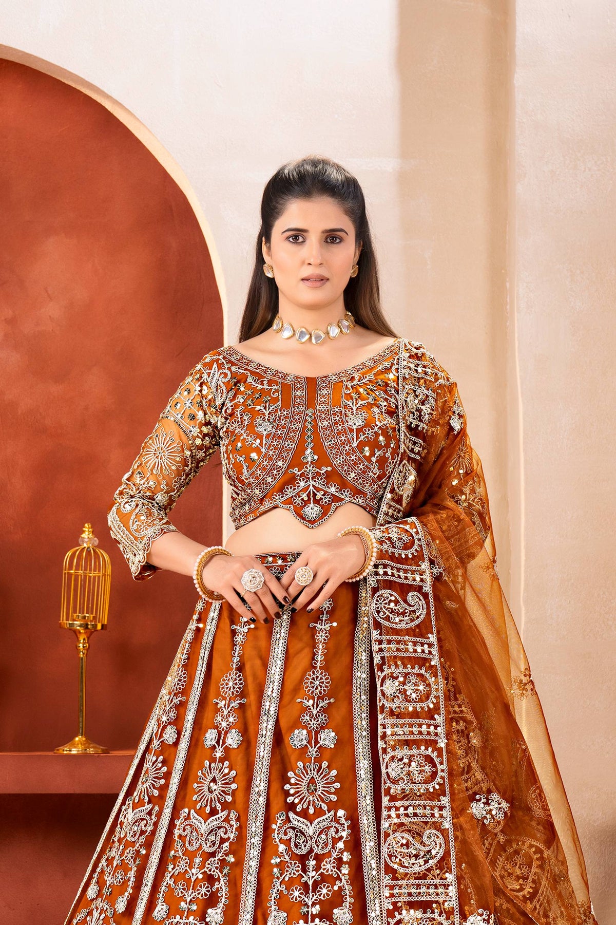 Lehenga Mart Flared Net Sequins And Codding Embroidery Work Rust Lehenga Choli Set