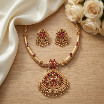 Jewel City Antique Gold Plated Matte Indian Necklace Set with Red Stones | Traditional Bollywood Wedding Jewelry with Earrings - Dista
