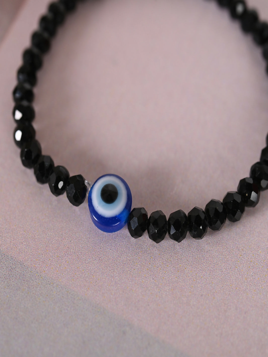 NVR Women & Men Black Evil Eye Elasticated Rakhi With Roli Chawal - Distacart