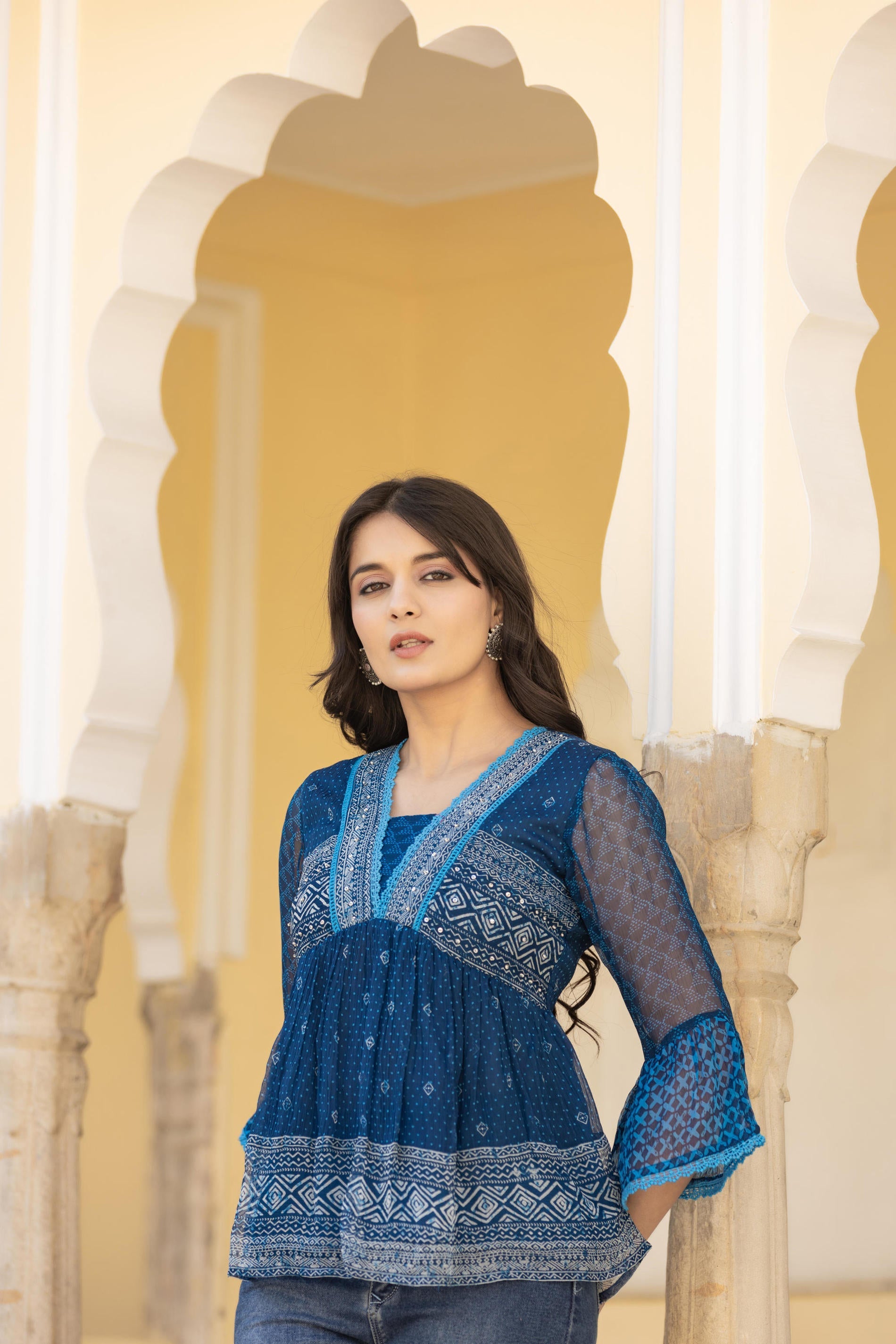 Juniper Indigo Blue Ethnic Motif Peplum Top with Sheer Sleeves