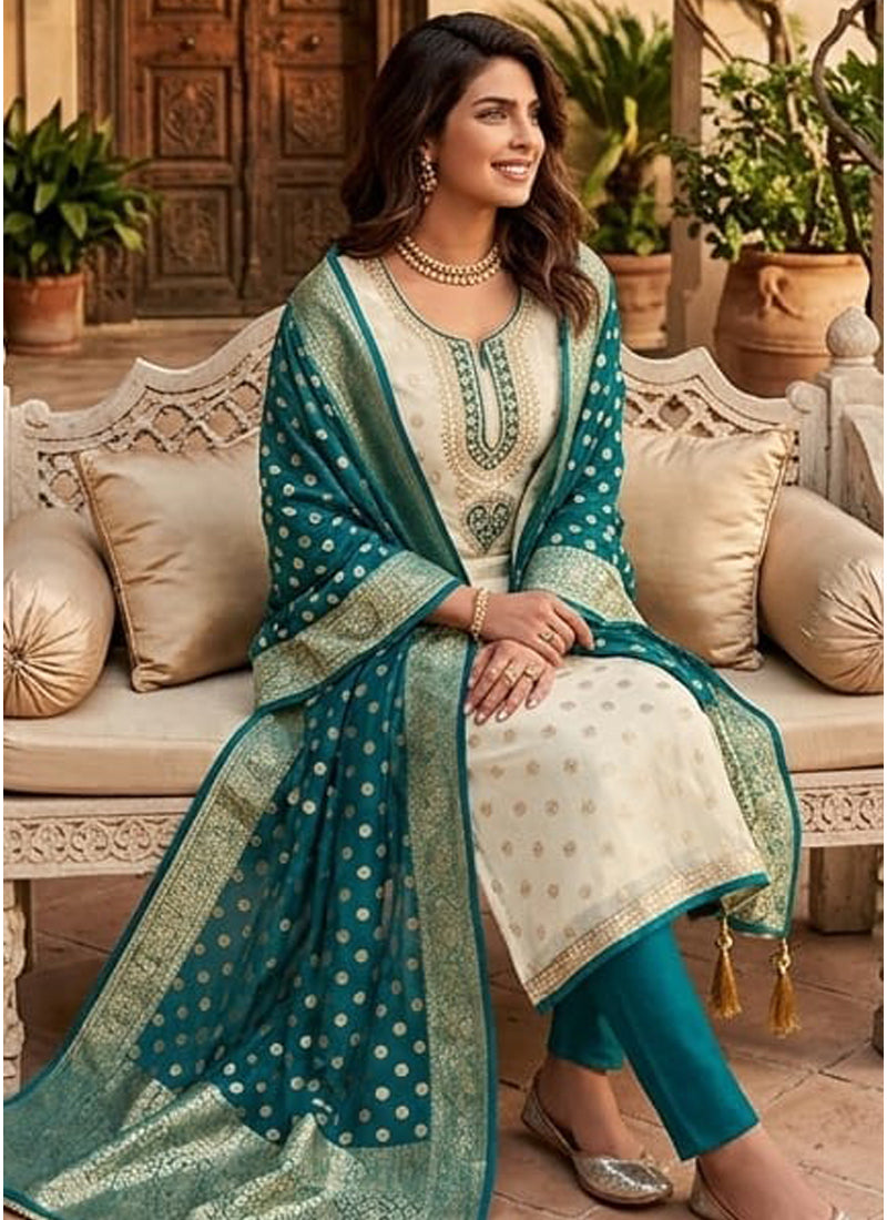 Vegaa Fashion Cream Embroidered salwar suit