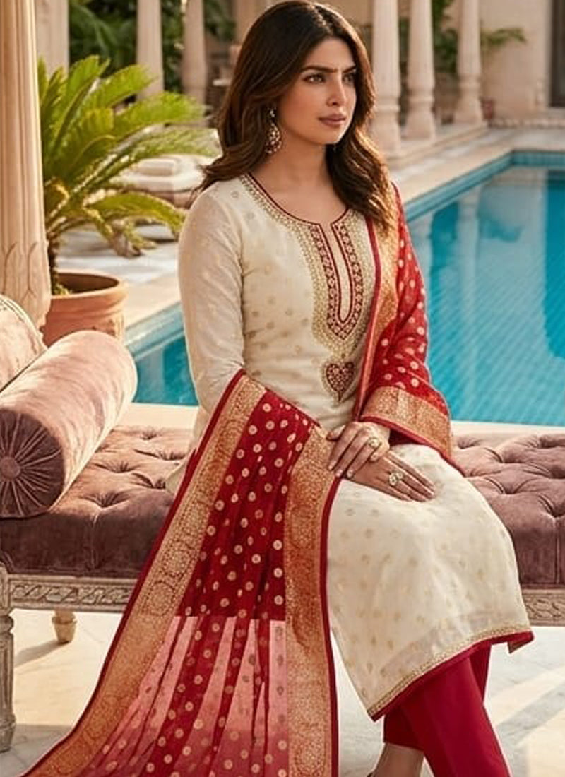 Vegaa Fashion Cream Embroidered salwar suit - Dista