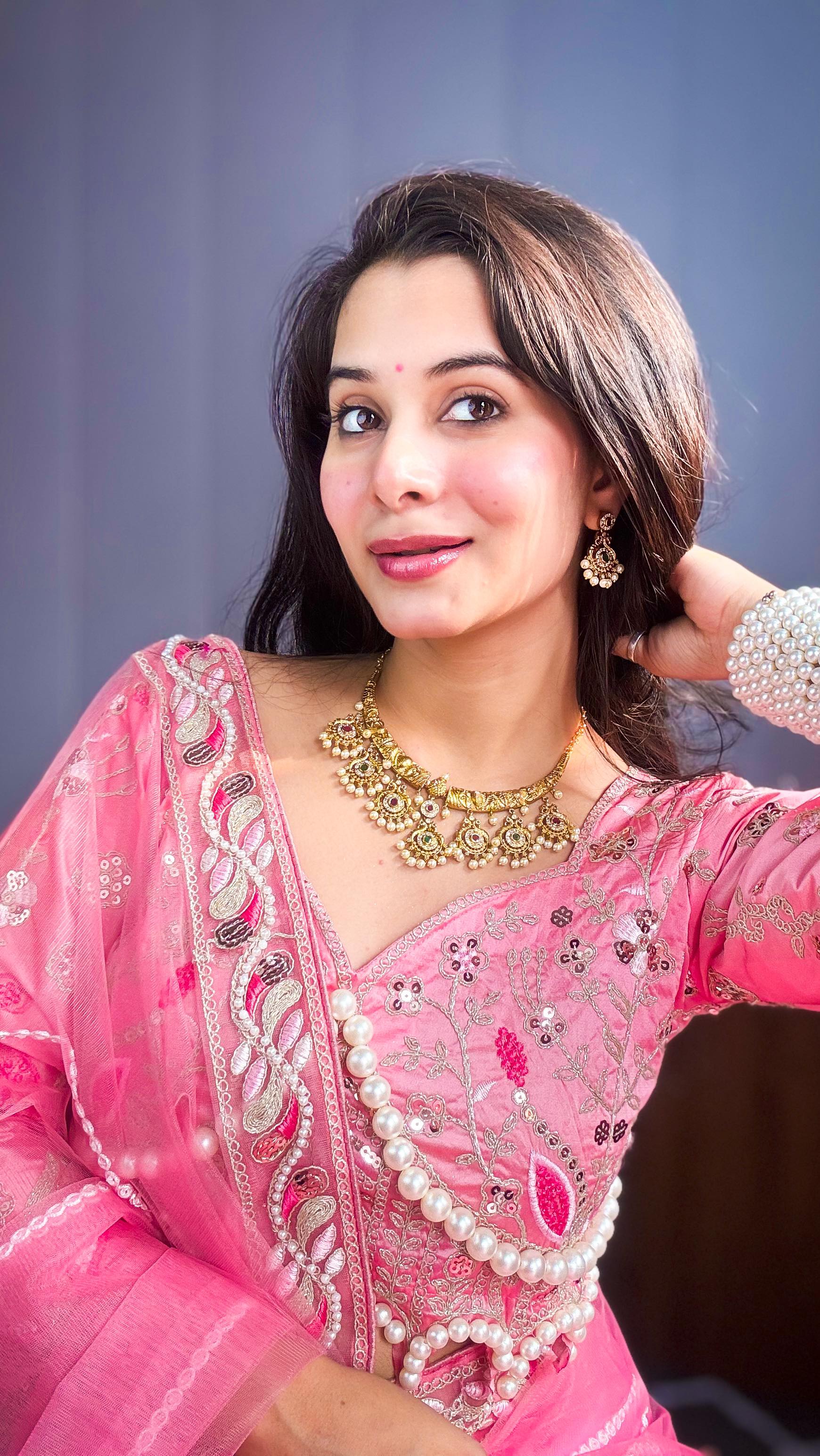 Evanik Pink Net Embroidery work Saree with Moti Hand work Blouse