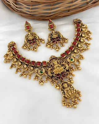 Jewel City Opulent Lotus Lakshmi Temple Necklace Set - Antique Gold Kundan Bridal Jewelry with Ruby and Emerald Accents