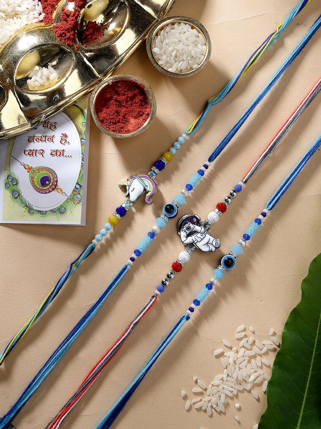 NVR Kids Set of 4 Multicolor Evil Eye & Artificial stone and beads Rakhi With Roli Chawal & Chocolate - Distacart