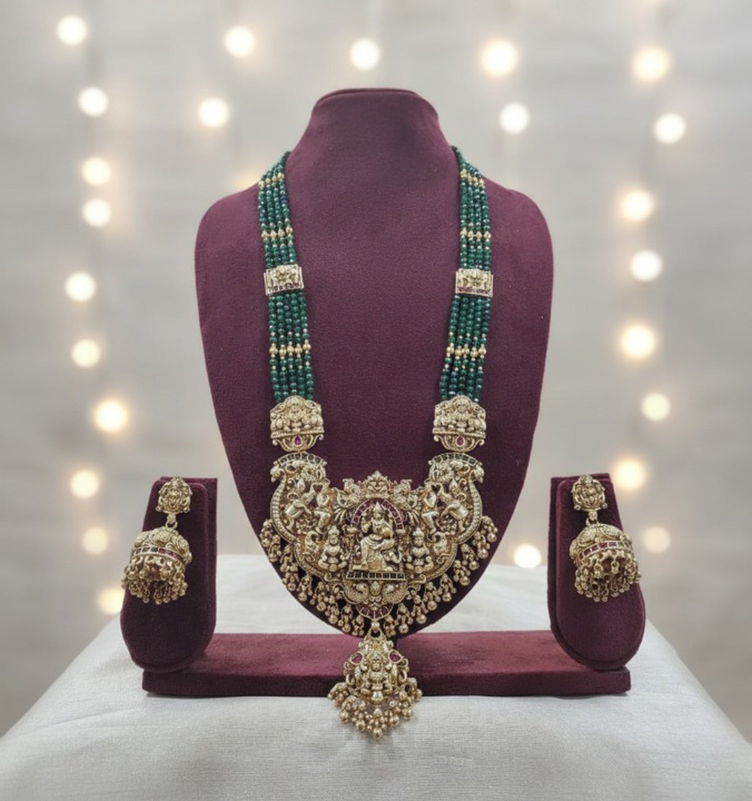 Jewel City Royal Temple Lakshmi Gold-Plated Bridal Haram Necklace Set with Jhumka Earrings, Green Beads, Traditional Jewelry