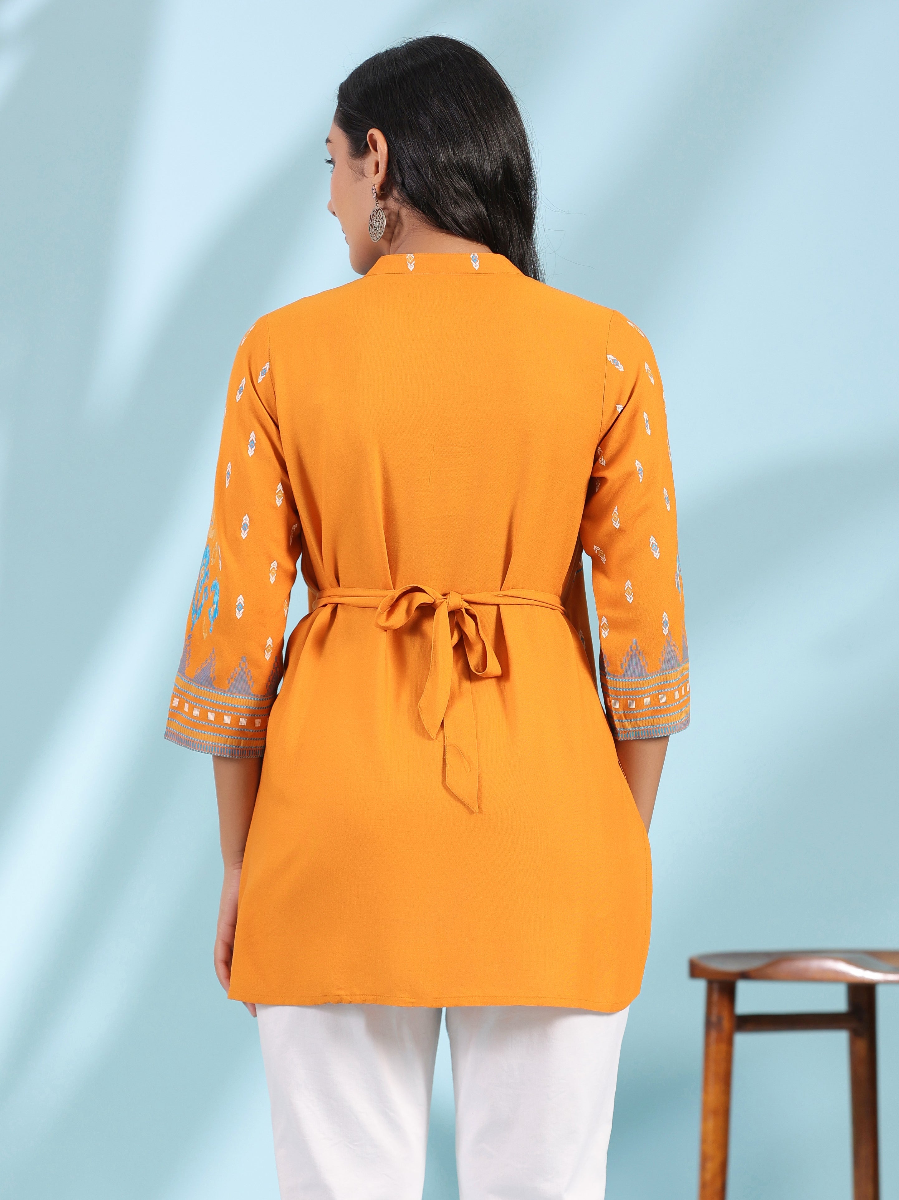 Juniper Mustard Rayon Ikat Placement Printed High-Low Tunic With Side Slits & Tassels - Distacart