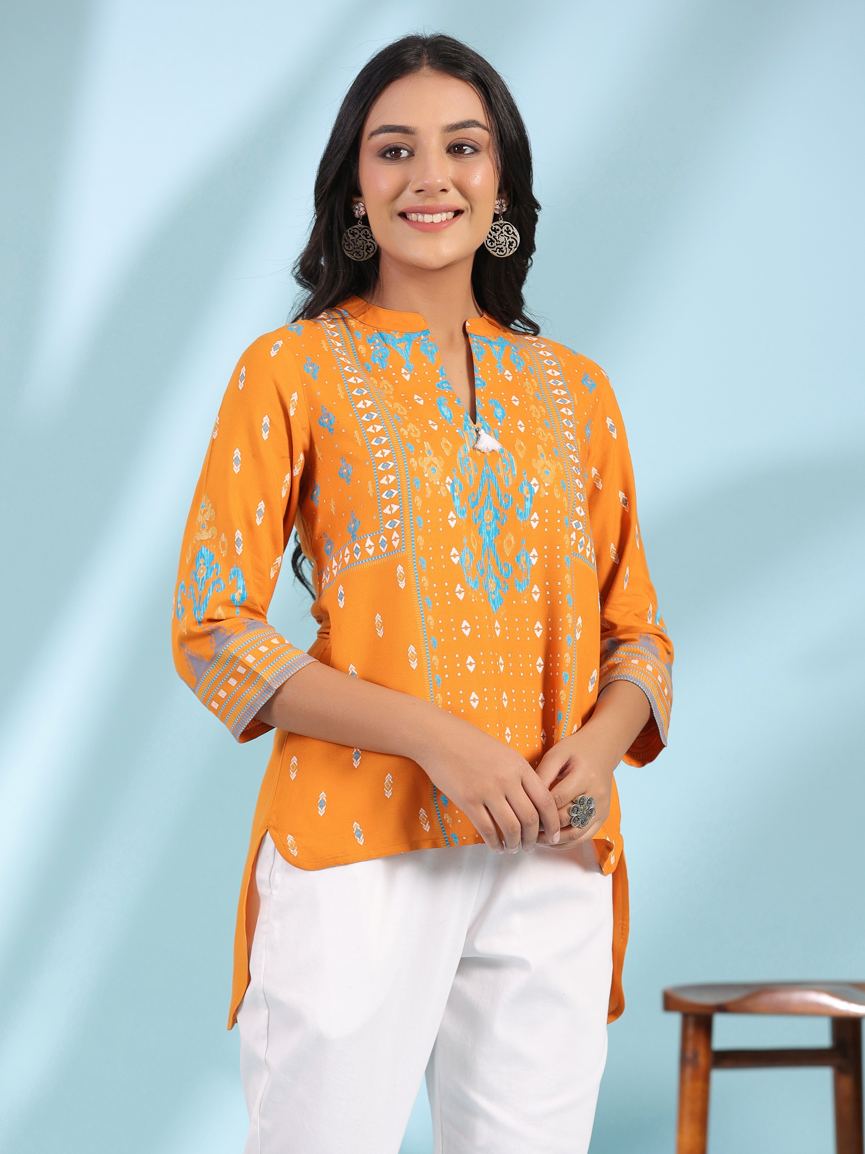 Juniper Mustard Rayon Ikat Placement Printed High-Low Tunic With Side Slits & Tassels - Distacart