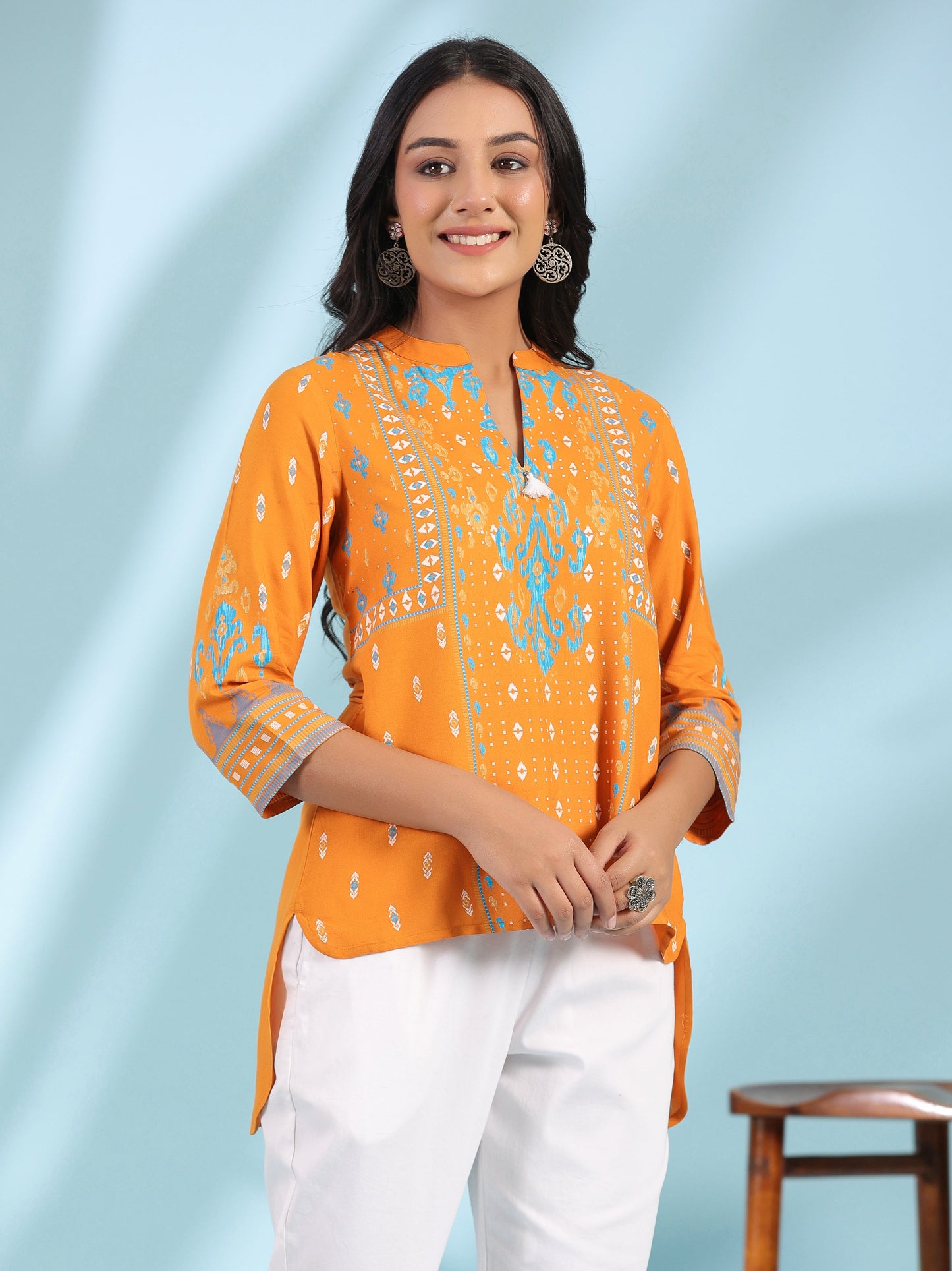 Juniper Mustard Rayon Ikat Placement Printed High-Low Tunic With Side Slits & Tassels - Distacart