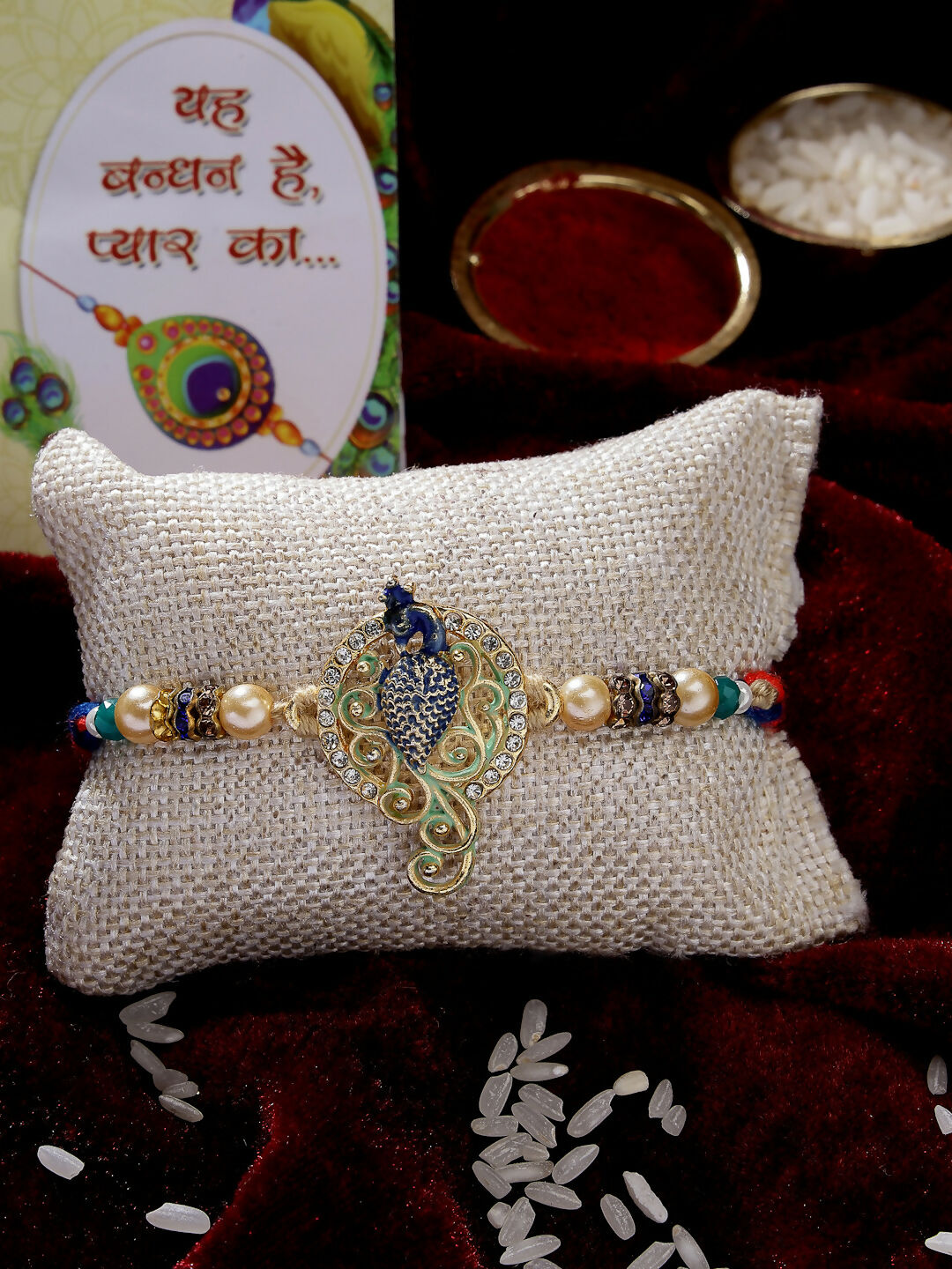 NVR Men Gold-Toned Peacock Design Stone-Studdded Rakhi With Roli Chawal & Chocolate - Distacart