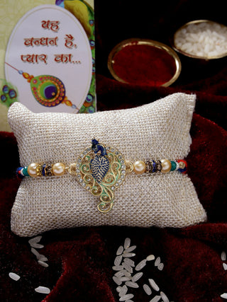 NVR Men Gold-Toned Peacock Design Stone-Studdded Rakhi With Roli Chawal & Chocolate - Distacart