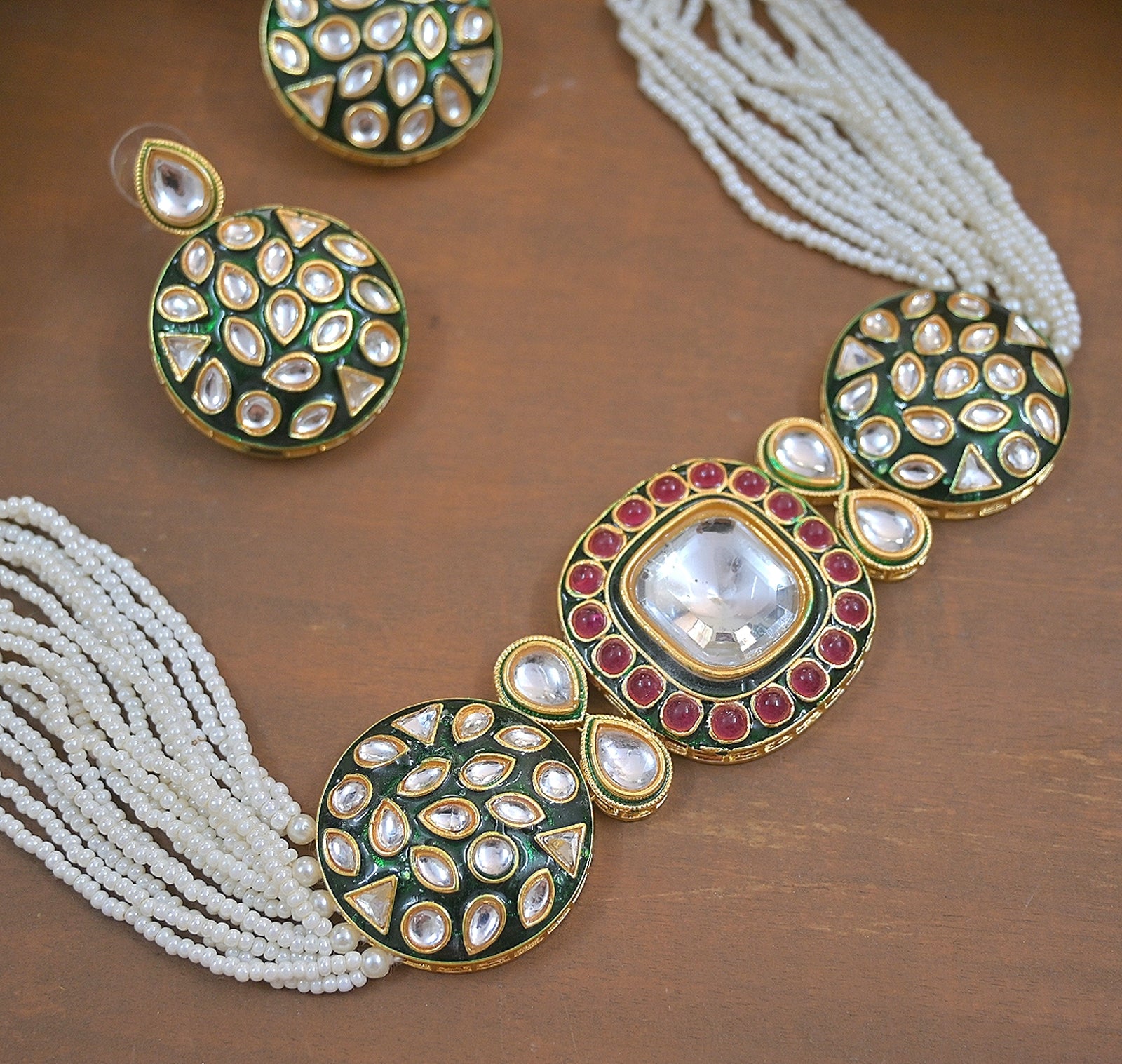 Jewel City Luxury Kundan Pearl Side Necklace Set - Handcrafted Indian Bridal Jewelry with Green Meenakari and Ruby Accents
